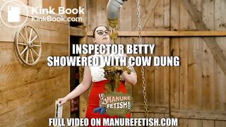 Inspector Betty showered with cowshit