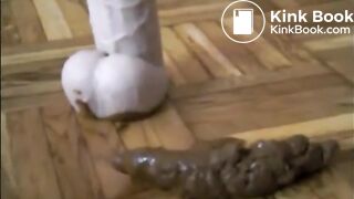 Girl shitting while is riding a dildo