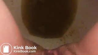 Girl pooping in toilet