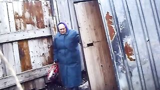 Old Russian woman takes a liquid shit outdoors voyeurstylec
