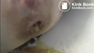 Woman is shitting a very liquid diarrhea in the bathtub