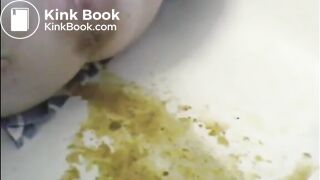 Woman is shitting a very liquid diarrhea in the bathtub