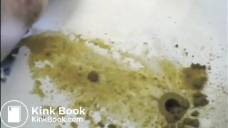 Woman is shitting a very liquid diarrhea in the bathtub