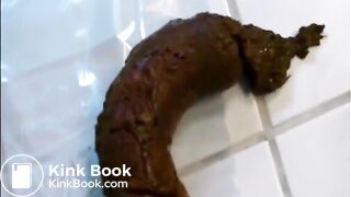 Woman shitting a long hard turd