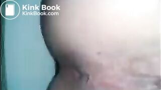 Woman shitting in the toilet closeup