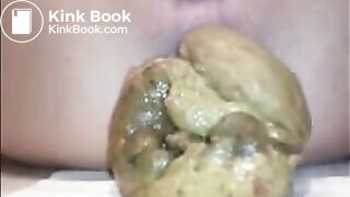 Woman shit a big load closeup