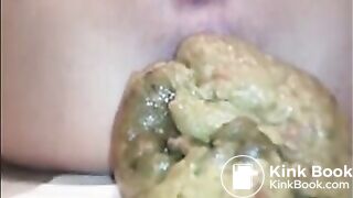 Woman shit a big load closeup