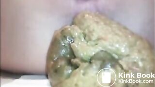 Woman shit a big load closeup