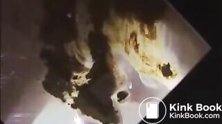 Woman shit and piss on a mirror table