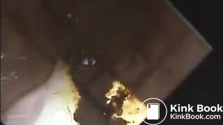 Woman shit and piss on a mirror table