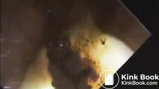 Woman shit and piss on a mirror table