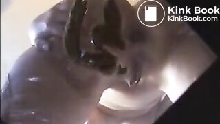 Woman shit and piss on a mirror table