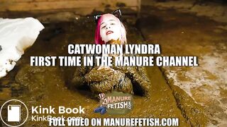 Catwoman Lyndra masturbates in cowshit