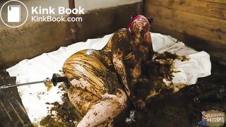 Catwoman Lyndra masturbates in cowshit