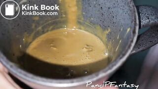 Pissing out of ass in cup