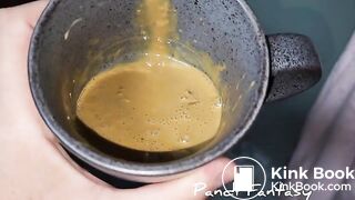 Pissing out of ass in cup