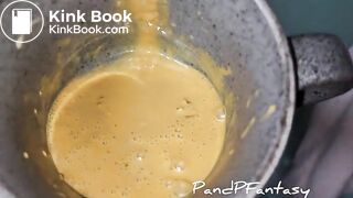 Pissing out of ass in cup