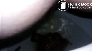 Girl shitting diarrhea in the toilet closeup