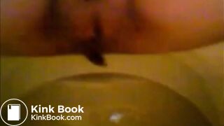 Girl shitting in the toilet and inserting dildo on her asshole