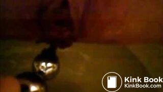 Girl shitting in the toilet and inserting dildo on her asshole