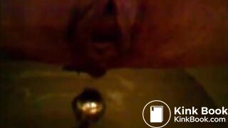 Girl shitting in the toilet and inserting dildo on her asshole