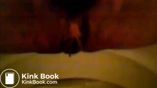 Girl shitting in the toilet and inserting dildo on her asshole