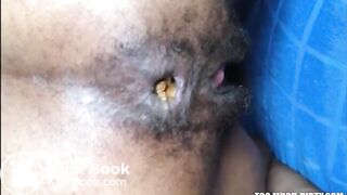 Hairy asshole ebony shitting closeup