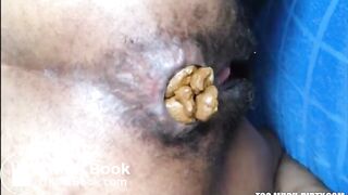 Hairy asshole ebony shitting closeup