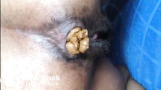 Hairy asshole ebony shitting closeup