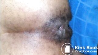 Hairy asshole ebony shitting closeup