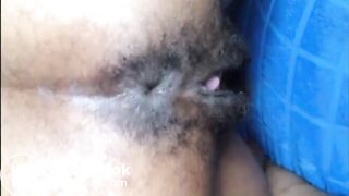 Hairy asshole ebony shitting closeup