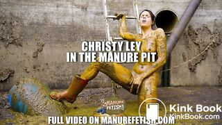 Christy Ley in the manure pit
