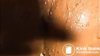 Woman shitting diarrhea and smearing it on her body