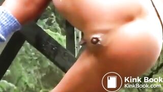 Girl with a pierced clit pooping on the slide