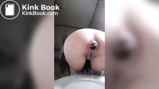 Girl shitting  very constipated turd