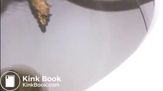 Woman shitting a long turd very slowly in the toilet