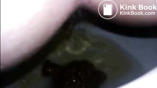 Girl shitting diarrhea in the toilet closeup