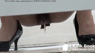 Sexy woman drops her jizz and a big turd in a public toilet