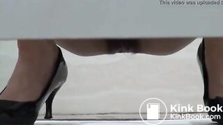 Sexy woman drops her jizz and a big turd in a public toilet