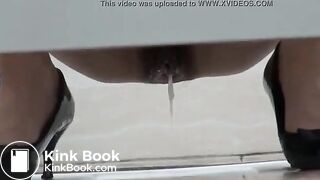 Sexy woman drops her jizz and a big turd in a public toilet