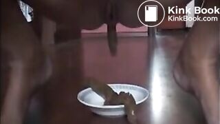 Woman shitting long turd on a plate