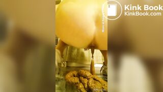 Horny MILF fills a plastic container with soft shit