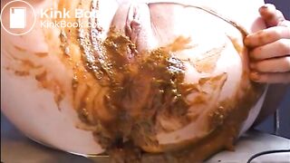 Woman shitting a big diarrhea on white pantyhose