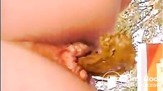 Girl shitting outdoor closeup