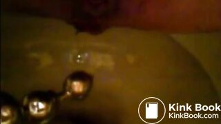 Girl shitting in the toilet and inserting dildo on her asshole