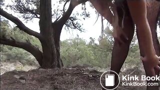 Nadia poop by a tree