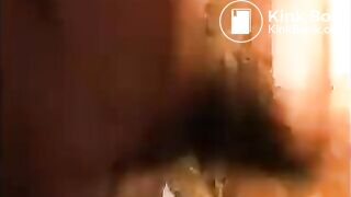 Woman shitting and smearing shit on her body
