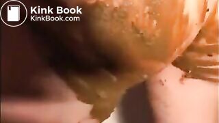 Woman shitting and smearing shit on her body