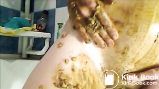 Big woman is smearing shit on her breast