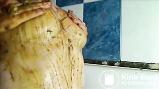 Big woman is smearing shit on her breast